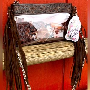 Western Bag

Carrie ” Clear Fringe Crossbody Bag / Wristlet ( Brown )